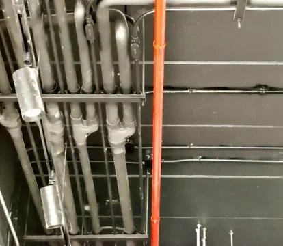 Wall-mounted conduit Stock Photos