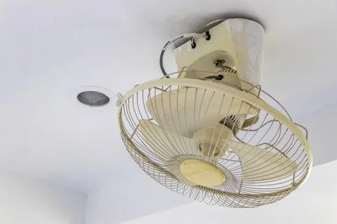 Wall Mounted Electric Fan In Simple Thai Hotel Room Interior Thailand. Stock Photos