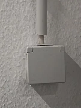 Wall-mounted electrical junction box with conduit Stock-Fotos