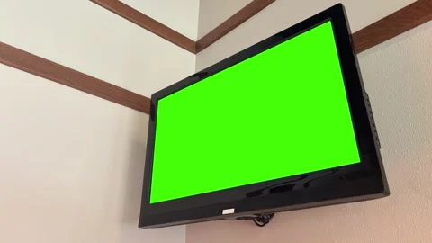 Wall-Mounted Green Screen TV In cafe or restaurant Stock Footage 313813128