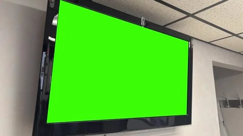 A Wall Mounted Green Screen TV in Doctor Office 1 Stock Footage 321717446