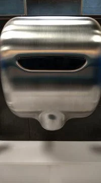 Wall mounted hand dryer Stock Photos