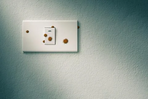 Wall mounted light switch on concrete wall with virus or germ effect Stock Photos