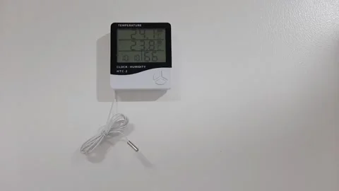 Wall mounted room temperature thermometer Stock Footage 296849045