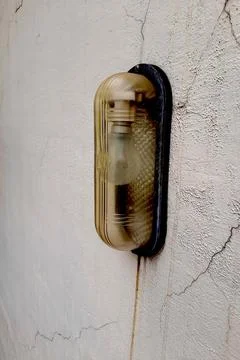 Wall Mounted, Shielded Electrical Bulb Stock Photos