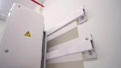 Wall mounted solar battery pack. Zoom out at white room in solar factory 스톡 동영상 332791742