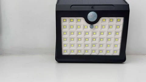 Wall Mounted Solar LED Light with Motion Sensor and Panel 스톡 동영상 329904425