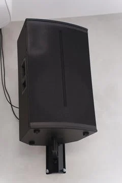 Wall-mounted speaker setup for effective sound distribution in a venue Stock Photos