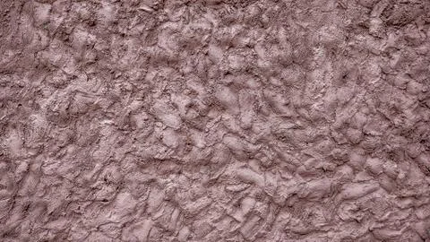 A wall of mud, cement putty decorative background, a mixture of earth smeared on Stock Photos