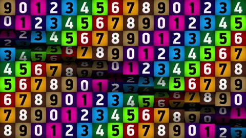 A wall of multicolored rotating cubes with numbers. Stock Footage 137811924