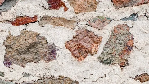 Wall of multicolored stones of different shapes Stock-Footage 310799244