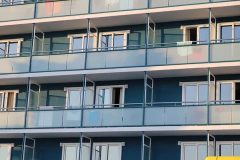 Wall with multiple windows and balconies Stock-Fotos