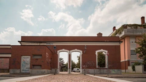 Wall with murals with clouds and people. Timelapse 4K Stock Footage 141291716