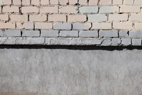Wall og white bricks and  painted concrete frame for text, a lot of copyspace Fotos de archivo