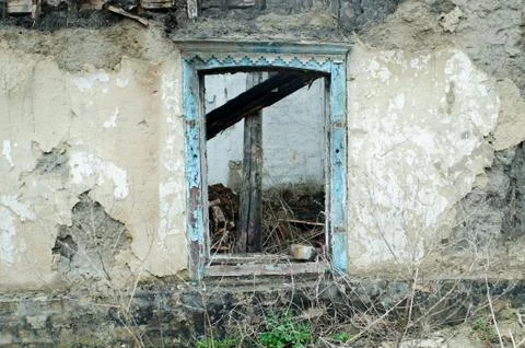 Wall of the old building with window Stock Photos