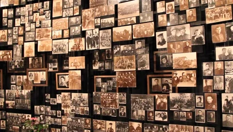 Wall with old photos Stock Footage 4982716