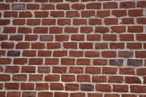 The wall of old red brick. Stockfoto's