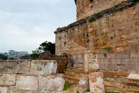 The wall of the old tower. The brick collapsed the fence. Antalya, Turkey, Ap Stock Photos