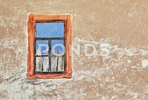 Wall of old ukrainian house with a window Stock Photos