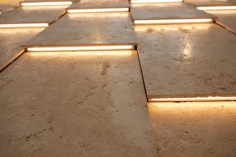 Wall or ceiling viewed in backlight. Tilt view of lath panels resembling stru Stock Photos