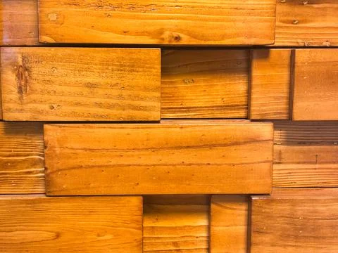Wall or surface constructed from horizontally and vertically oriented wooden Stock Photos