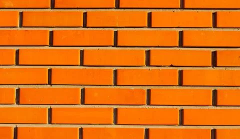 Wall of orange bricks Foto stock