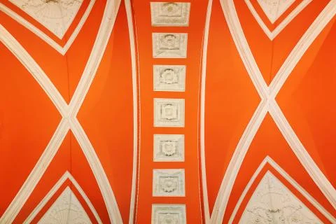 Wall ornament with abstract pattern in orange-white color Stock Photos