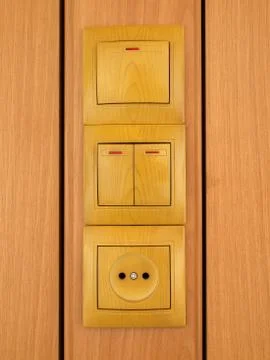 Wall outlets end electric switch. Stock Photos