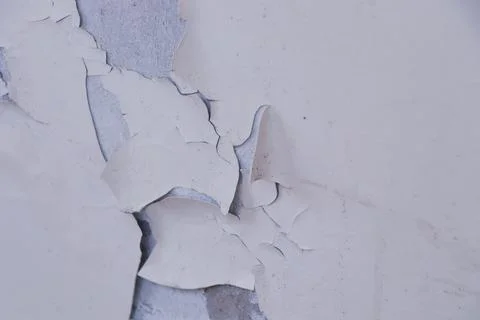Wall paint damage due to moisture in close up Stock Photos