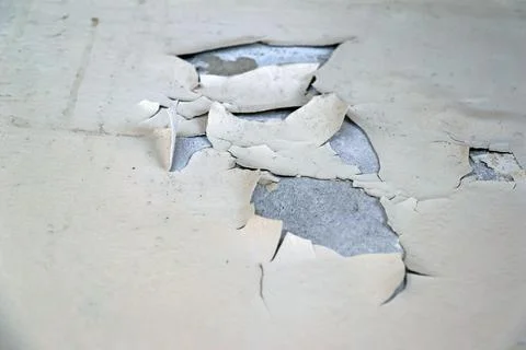Wall paint damage due to moisture in close up Stock Photos