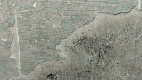 Wall paint that is peeling because the wall is damp Stock Footage 285591199