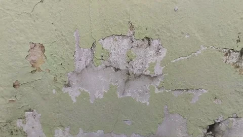 Wall paint that is peeling because the wall is damp Stockbeeldmateriaal 306206292