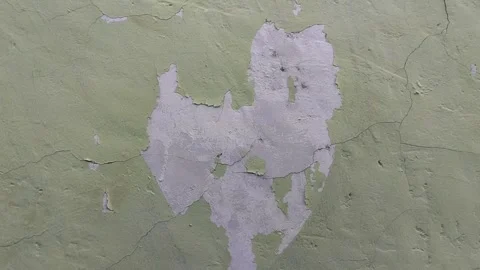 Wall paint that is peeling because the wall is damp Stockbeeldmateriaal 306206430
