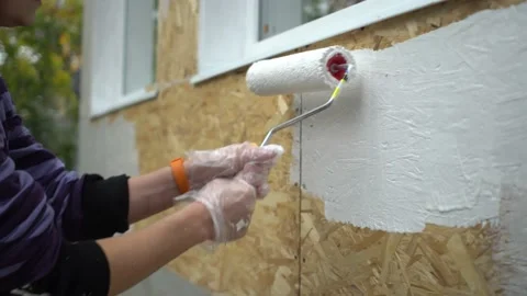Wall paint roller close-up house repair Stock Footage 200949592
