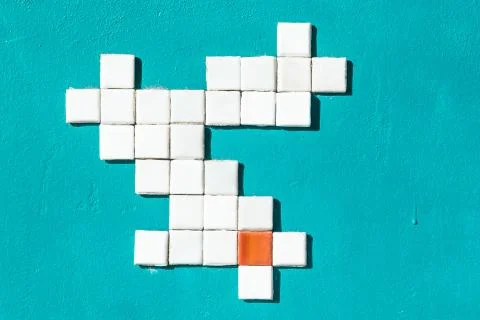 On the wall a pattern of small white tiles. Stock Photos