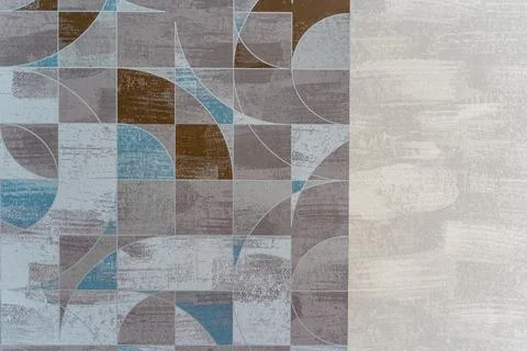 A wall with a patterned design and a white background Stock Photos