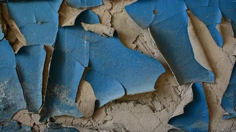 Wall with peeling blue paint and cracked plaster Stock Footage 138515563