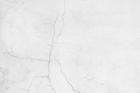 A wall with a peeling surface and roughness close-up.Texture or background Stock Photos