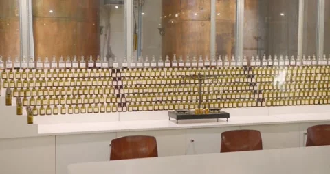 A Wall of Perfume Bottles Lines the Shelves at the Fragonard Perfume Museum in Vidéo 333182523