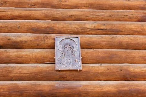 Wall of pine logs. Texture of a horizontal wooden wall. Wood wall texture for Stock Photos