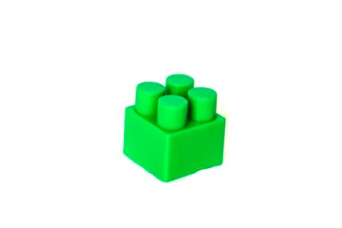 Wall from Plastic building blocks isolated on white background. Stock Photos
