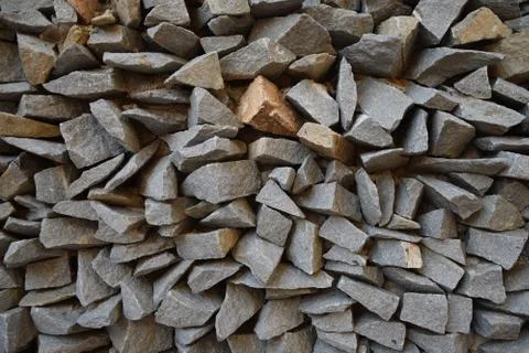 Wall of pointed and irregulars rocks, on perspective. Stock Photos
