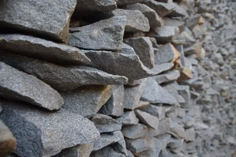 Wall of pointed and irregulars rocks, on perspective. Stock Photos