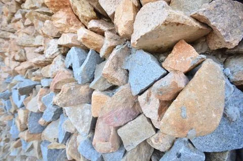 Wall of pointed and irregulars rocks, on perspective. Stock Photos