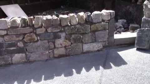 Wall project with soil, grass and stones Video stock 321906300