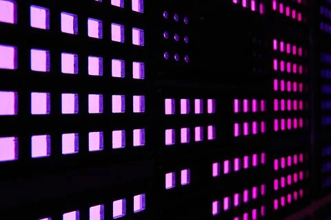 Wall of purple square lights on computer Foto stock