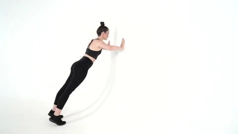 WALL PUSH UPS Stock Footage 166294488