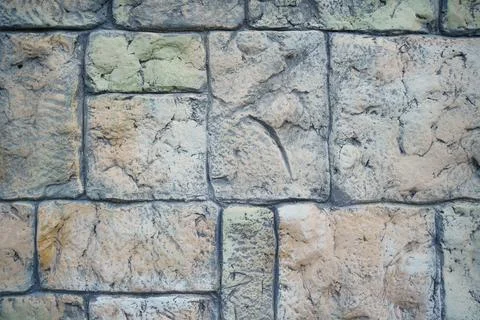 Wall of rectangular stone bricks. background and texture of cobblestones. Foto stock