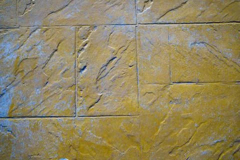 Wall of rectangular stone bricks. background and texture of cobblestones. Fotos Stock