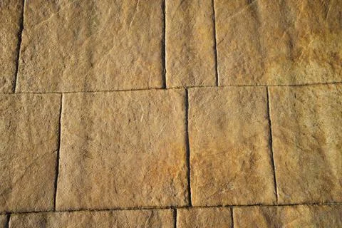 Wall of rectangular stone bricks. background and texture of cobblestones. 스톡 사진